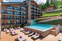 Hotel ADAPURA Wagrain - Relax-Terrasse mit beheiztem Außenpool