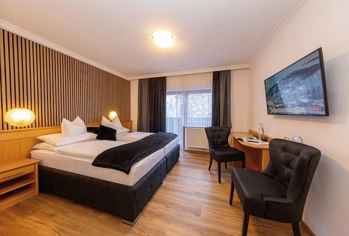 Hotel Austria Saalbach - Wohnbeispiel Doppelzimmer Haupthaus (Zimmercodierung DB7)