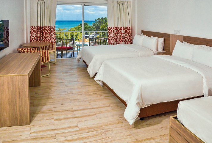 Grand Decameron Cornwall Beach, A Trademark All-Inclusive Resort - Wohnbeispiel Standard Ocean View (Zimmercodierung UBM)