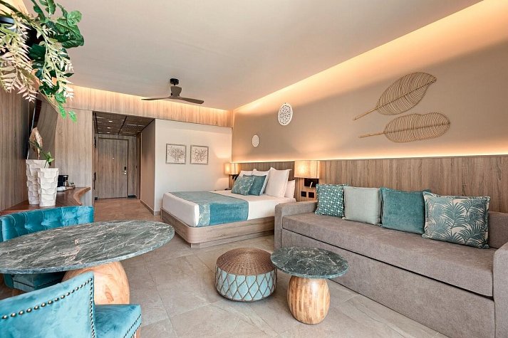 Serenade Caribe Club Family Beach Resort - Wohnbeispiel Luxury Garden View (Zimmercodierung UUG)