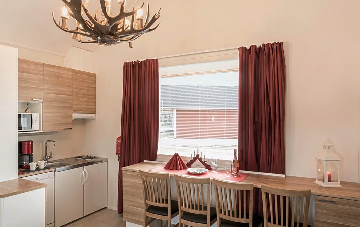 Santa Claus Holiday Village - Wohnbeispiel Superior Cottage B (Zimmercodierung SS1)