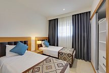 Ramada Resort Kusadasi & Golf - Wohnbeispiel Familienzimmer seitl. Meerblick (Zimmercodierung FBN)