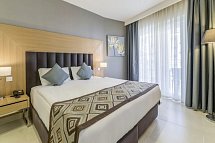 Ramada Resort Kusadasi & Golf - Wohnbeispiel Juniorsuite seitlicher Meerblick (Zimmercodierung JS1)
