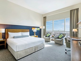 Grand Millennium Al Wahda - Wohnbeispiel Deluxe Room (Zimmercodierung UD1)