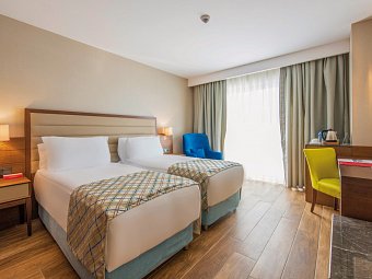 Ramada Plaza Hotel - Wohnbeispiel Doppelzimmer mit Stadtblick (Zimmercodierungen DB1 & DC1)