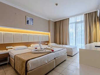 Incekum Su - Wohnbeispiel Doppelzimmer Gartenblick