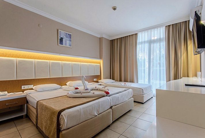 Incekum Su - Wohnbeispiel Doppelzimmer Gartenblick