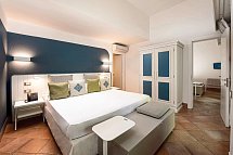 Chia Laguna - The Village - Wohnbeispiel Doppelzimmer Garten Cottage mit Verbindungstür