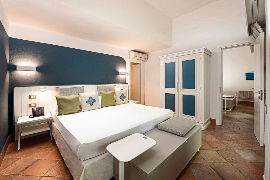 Chia Laguna - The Village - Wohnbeispiel Doppelzimmer Garten Cottage mit Verbindungstür