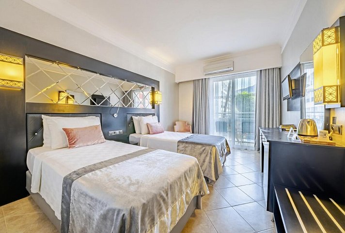 Prime Beach Hotel - Wonbeispiel Doppelzimmer Standard Meerblick (Zimmercodierungen DGM, DCM, DGL & DCL)