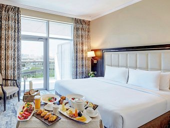 Copthorne Hotel Dubai - Wohnbeispiel Deluxe Suite One King Creek View (Zimmercodierung WB2)
