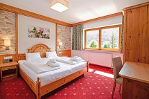 Ferienclub Bellevue am Walchsee - Wohnbeispiel Familiensuite 3-Raum Seeseite (Zimmercodierungen WI1 & WI2)