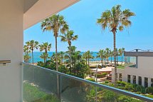 Olympic Lagoon Resort Paphos - Beispiel Ausblick Balkon Doppelzimmer Superior seitl. Meerblick (Zimmercodierung DSN)