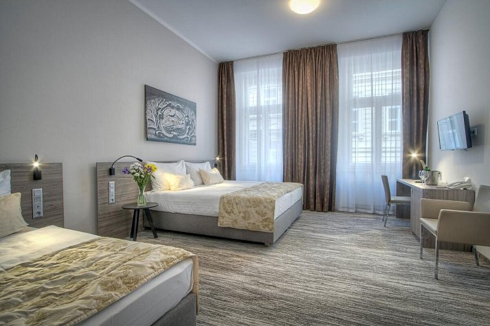 Hotel Páv - Wohnbeispiel Dreibettzimmer