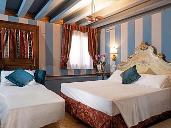 Hotel Tiziano - Wohnbeispiel Dreibettzimmer (Zimmercodierung TB1)