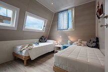 Marina Azzurra Resort - Wohnbeispiel Hausboot Garten (Zimmercodierungen OB3 & OX3)