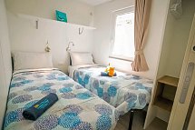 Camping Village Butterfly (by Happy Camp) - Wohnbeispiel Mobilheim Happy Superior (Zimmercodierung CS1)