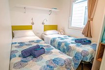 Camping Cisano & San Vito (by Happy Camp) - Wohnbeispiel Mobilheim Happy Superior (Zimmercodierung CS1)