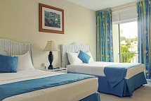 Time Out Hotel - Wohnbeispiel Poolview (Zimmercodierung UB1)
