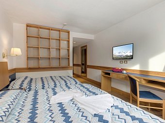 Club Hotel Regina e Fassa - Wohnbeispiel Familienzimmer (Zimmercodierung FB1)