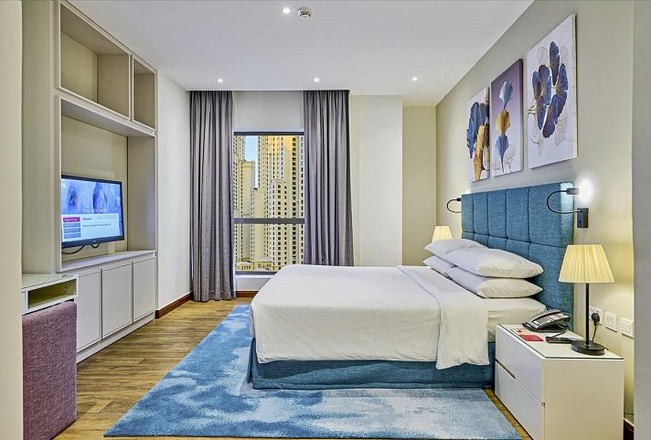 Ramada Hotel & Suites by Wyndham Dubai JBR - Wohnbeispiel One Bedroom King Suite City View (Zimmercodierung AB1)