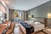 Astir Odysseus Resort & Spa - Wohnbeispiel Doppelzimmer Deluxe Swim-Up (Zimmercodierung DDQ)