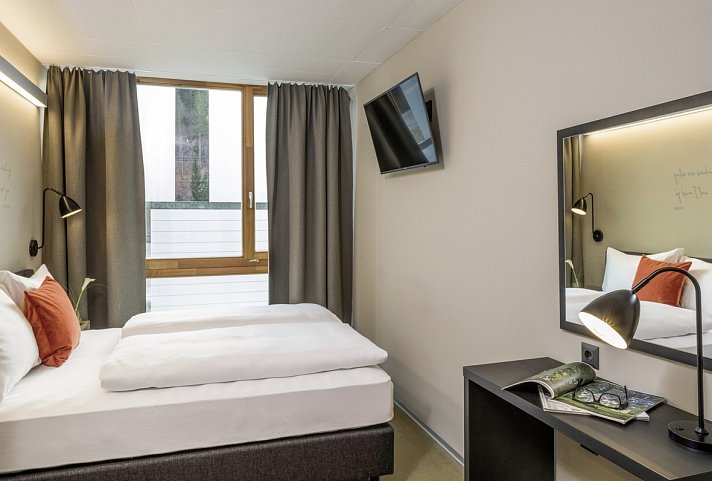 Arena Franz Ferdinand Nassfeld - Wohnbeispiel Doppelzimmer Economy Typ M (Zimmercodierung DE1)