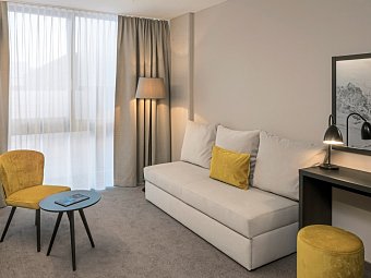Arena Franz Ferdinand Nassfeld - Wohnbeispiel Familienzimmer Typ XL Schlafsofa (Zimmercodierung FB2)