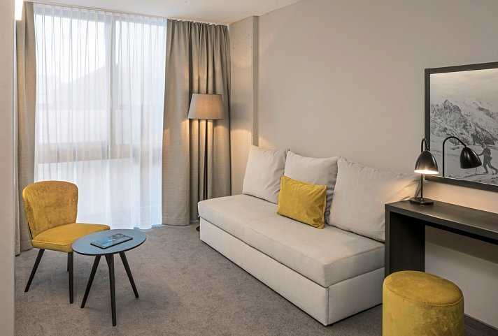 Arena Franz Ferdinand Nassfeld - Wohnbeispiel Familienzimmer Typ XL Schlafsofa (Zimmercodierung FB2)