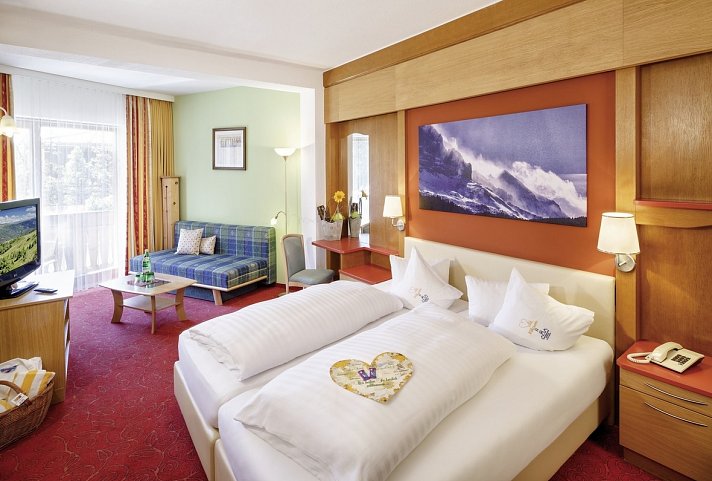 Familienhotel Hinteregger - Wohnbeispiel Familienzimmer SchwalbenNest (Zimmercodierungen FB1 & FB2)