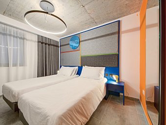 IKYK Hotel - Wohnbeispiel Doppelzimmer Economy (Zimmercodierung DE1)