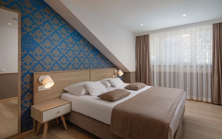 Tamaris Aparthotel - Wohnbeispiel DZ Economy Bergblick (Zimmercodierungen DEB & DC1)