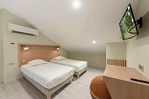 La Pagerie Tropical Garden Hotel - Wohnbeispiel Confort Gardenview Quadruple (Zimmercodierung F1G)
