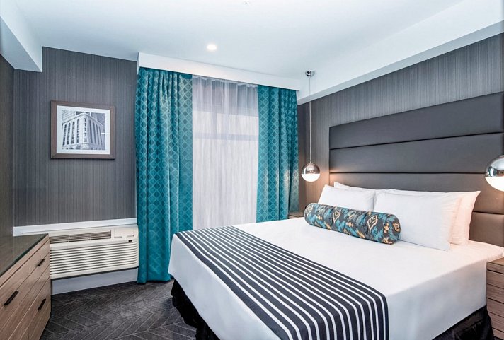 Sandman Signature Hotel Calgary Airport - Wohnbeispiel Signature Corporate King Room