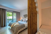 Eliros Mare Beachfront Poem Hotel - Wohnbeispiel Juniorsuite Gartenblick (Zimmercodierung J1G)