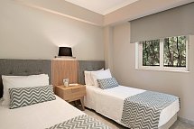 Pilot Beach Resort - Wohnbeispiel Familienzimmer Gartenblick (Zimmercodierung FBG)