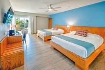 Coral Costa Caribe Beach Resort - Wohnbeispiel Deluxe Room (Zimmercodierung UDM)